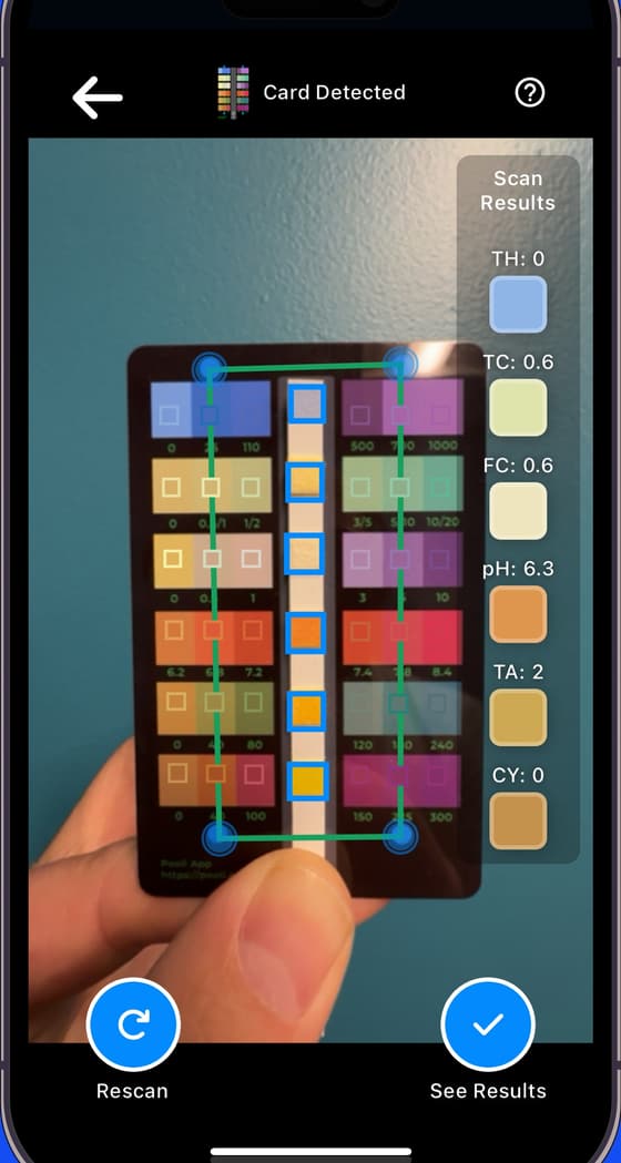 Pooli SCAN with a test strip detected and live results for hardness, chlorine, pH, alkalinity, and cyanuric acid